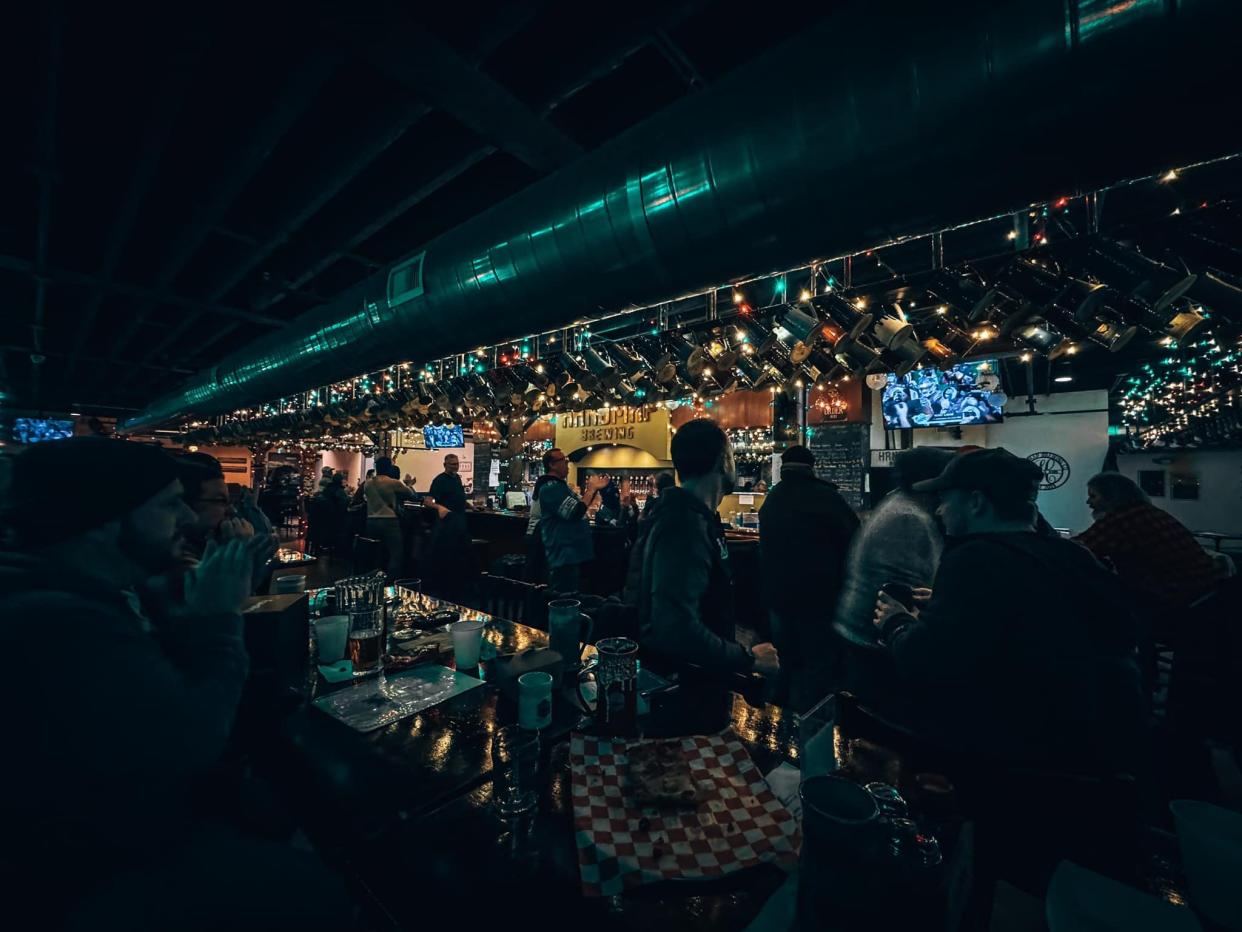 Detroit Lions fans gather inside Handmap Brewing to watch the Lions face the Los Angeles Rams in the wild card round.