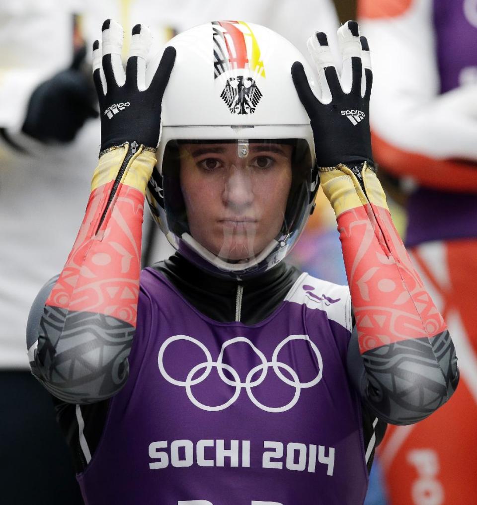 Natalie Geisenberger of Germany prepares to start her run during a training session for the women's singles luge at the 2014 Winter Olympics, Thursday, Feb. 6, 2014, in Krasnaya Polyana, Russia. (AP Photo/Michael Sohn)