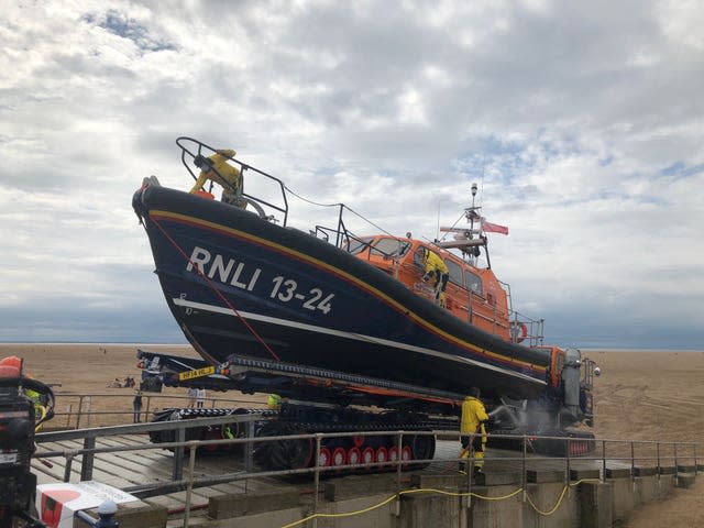 The RNLI lifeboat returns after searching for the Shabbir brothers (Kim Pilling/PA)