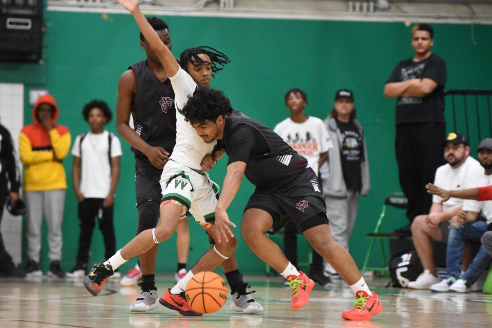 Victor Valley’s Isaiah Butler guards a Granite Hills player during the fourth quarter on Thursday, Jan. 25, 2024. Victor Valley defeated Granite Hills 64-61.