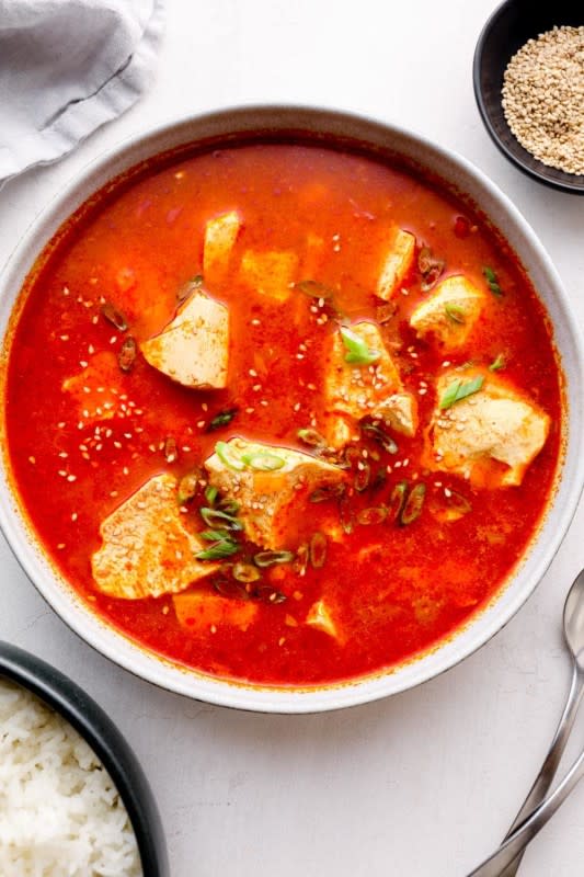 <p>Darn Good Veggies</p><p>Korean tofu soup – a favorite one pot meal with fragrant garlic, spicy kimchi, and silky soft tofu. Ready in 30 minutes!</p><p><strong>Get the recipe: <a href="https://www.darngoodveggies.com/korean-tofu-soup/" rel="nofollow noopener" target="_blank" data-ylk="slk:Spicy Korean Tofu Soup;elm:context_link;itc:0;sec:content-canvas" class="link "><em>Spicy Korean Tofu Soup</em></a></strong></p>