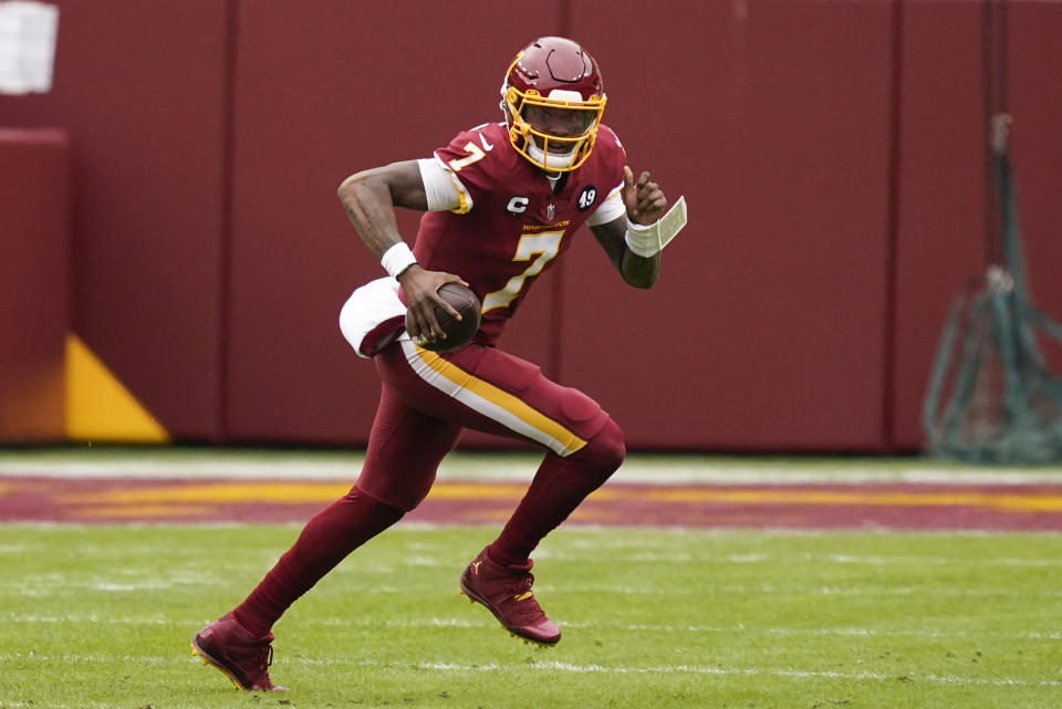 Washington Football Team quarterback Dwayne Haskins (7) runs with the ball during the first half of an NFL football game against the Seattle Seahawks, Sunday, Dec. 20, 2020, in Landover, Md. (AP Photo/Andrew Harnik)