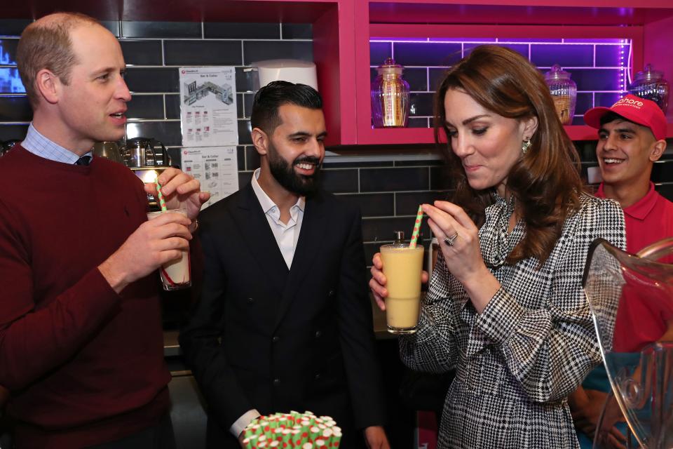 Britain's Prince William, Duke of Cambridge and Britain's Catherine, Duchess of Cambridge help make glasses of Kulfi lassi during a visit to the British Asian 'MyLahores' flagship restaurant in Bradford on January 15, 2020, to learn about some of the community work undertaken by the restaurant. (Photo by Chris Jackson / POOL / AFP) (Photo by CHRIS JACKSON/POOL/AFP via Getty Images)