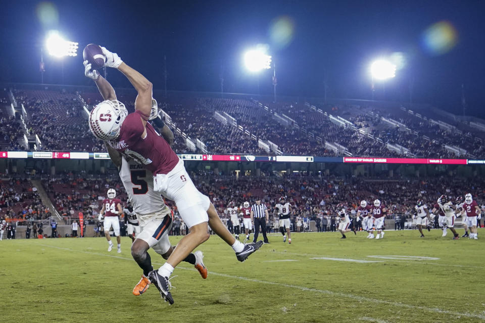 Stanford wide receiver Brycen Tremayne (81) catches a 21-yard touchdown over Oregon State defensive back Alex Austin (5) during the first half of an NCAA college football game in Stanford, Calif., Saturday, Oct. 8, 2022. (AP Photo/Godofredo A. Vásquez)