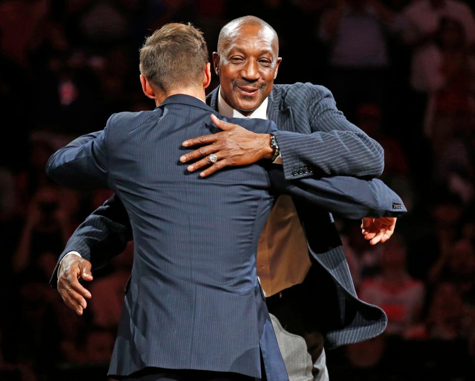 Former Sun Walter Davis hugs Phoenix Suns NBA All-Star point guard Steve Nash during his induction ceremonies into the Suns Ring of Honor at halftime on Oct. 30, 2015 in Phoenix, AZ.