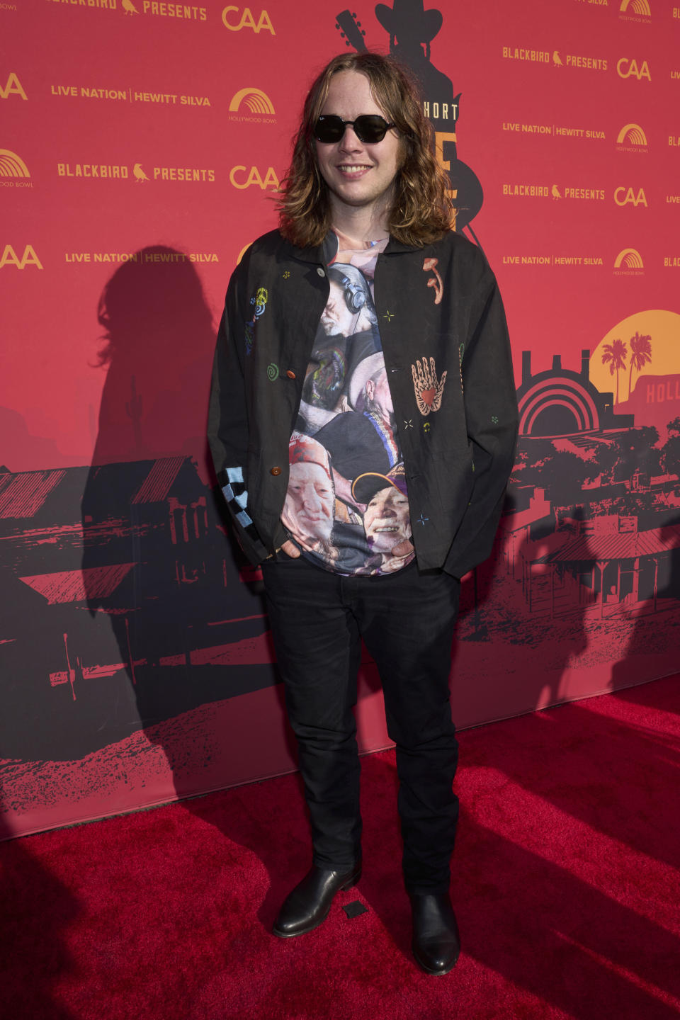 Billy Strings arrives at Willie Nelson 90, celebrating the singer's 90th birthday, on Saturday, April 29, 2023, at the Hollywood Bowl in Los Angeles. (Photo by Allison Dinner/Invision/AP)