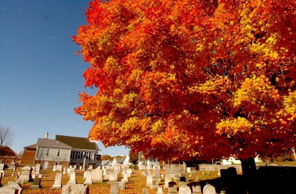 A cemetery on Green Street, just outside of Slatersville village in North Smithfield, is alight in fall color. Blackstone Valley Tourism Council President Bob Billington says Route 102, from North Smithfield to North Kingstown, offers abundant views of fall’s color palette.