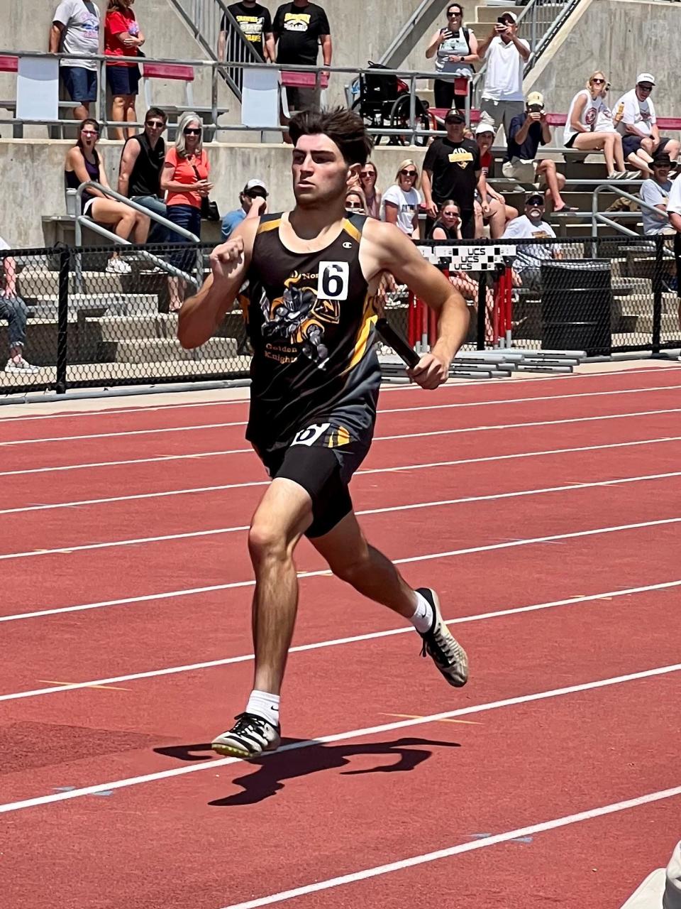 Northmor's Bo Landin runs a leg of the boys 4x400-meter relay at the Division III state track and field meet at Ohio State's Jesse Owens Memorial Stadium.