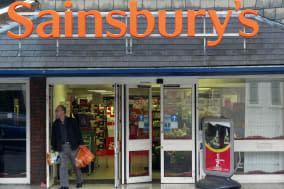 BRITAIN EARNS SAINSBURY'S