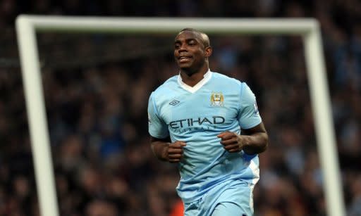 Manchester City's Micah Richards, pictured after scoring a goal during an English Premier League match in Manchester, in 2011. 37-year-old David Beckham was left out of Great Britain's final squad to allow coach Stuart Pearce to select Richards as his third over-age player along with Welsh duo Ryan Giggs and Craig Bellamy