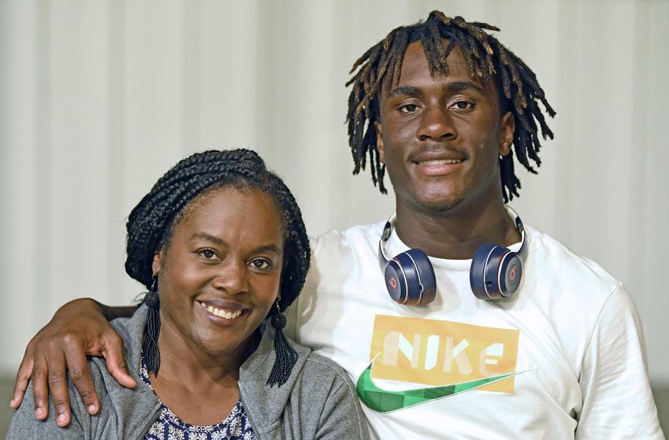 Coleia Thomas with her 16-year-old-son Isaiah Belt who is football running back for Riverview High School.