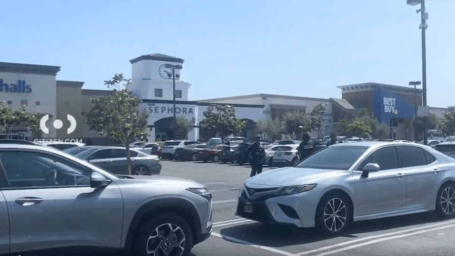 Police investigate after shots were reportedly fired at the Downey Landing shopping center in Downey on June 11, 2024. (Citizen)