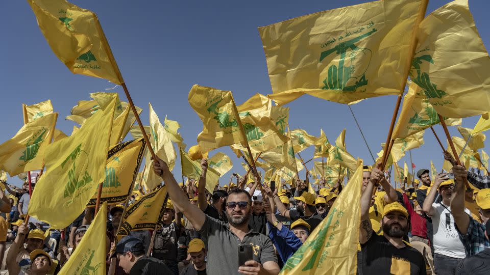 People with Hezbollah flags at a rally in Baalbek in Lebanon's Bekaa Valley in May 2022. - Francesca Volpi/Getty Images