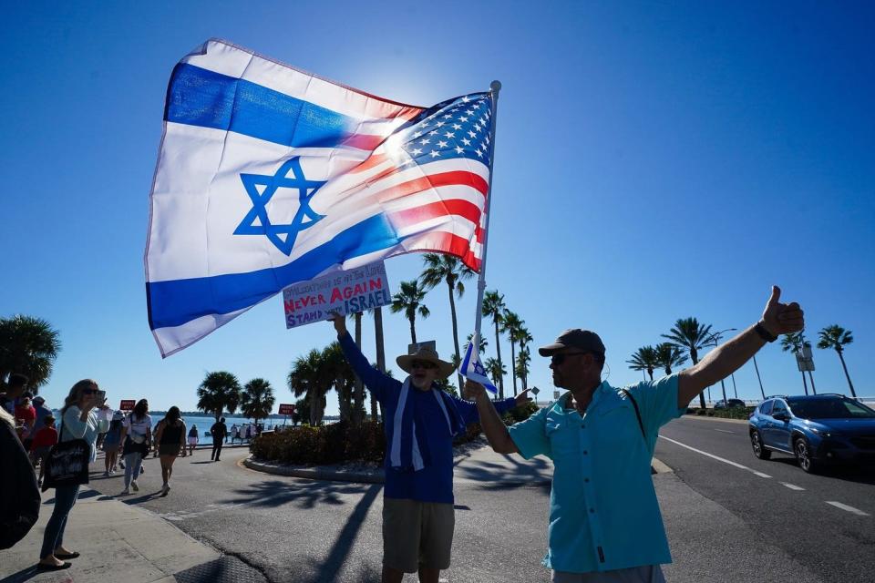 David Glosser, left, and Slava Burdman, both of Sarasota, join in a March against Hate-Bring the Hostages Home rally. The federation was joined by Sarasota Ministerial Association, Sarasota-Manatee Rabbinical Association and Aviva in hosting the event. The walk highlighted a call for the freedom of the more than 220 hostages held in Gaza and spoke out against rising antisemitism.