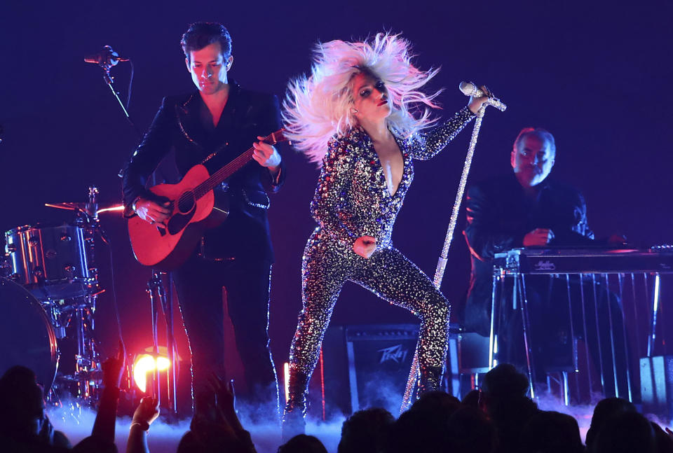 FILE - This Feb. 10, 2019 file photo shows Lady Gaga, right, and Mark Ronson performing "Shallow" at the 61st annual Grammy Awards in Los Angeles. Lady Gaga's latest album "Chromatica" was released on Friday. (Photo by Matt Sayles/Invision/AP, File)