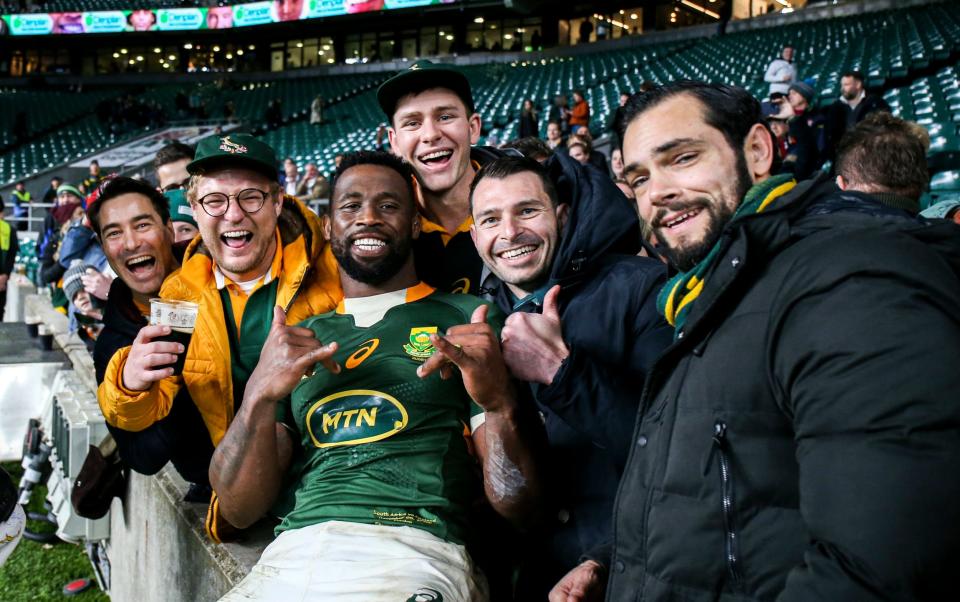 South Africa's Siya Kolisi with fans after during the Autumn International match at Twickenham Stadium, - Ben Whitley/PA