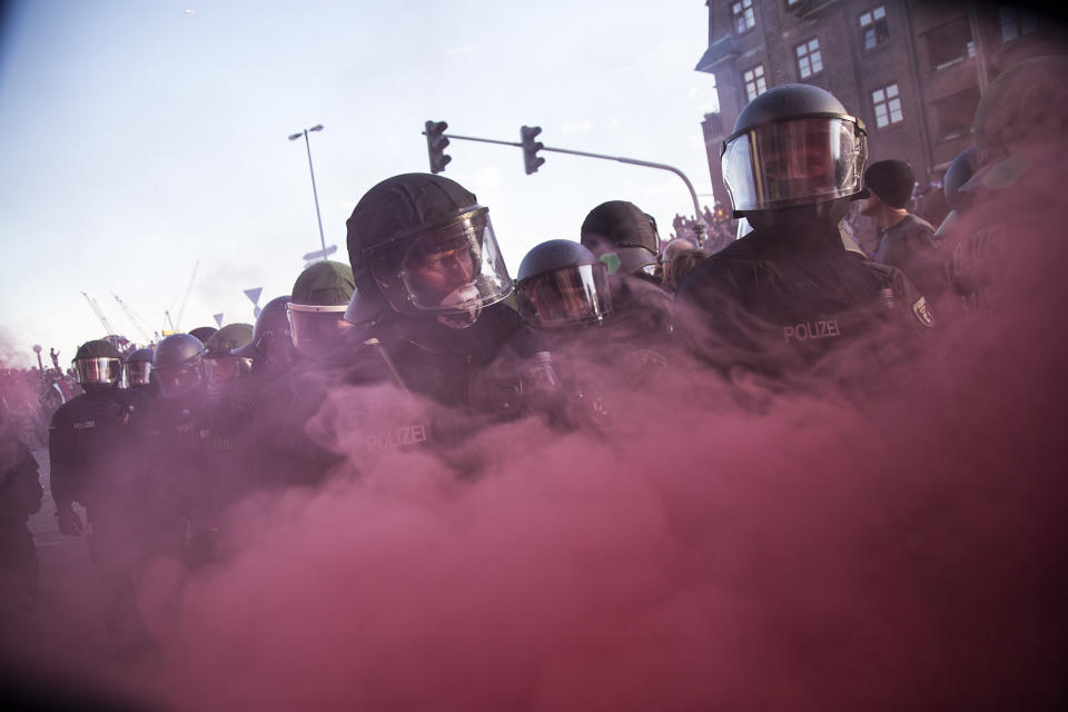 <p>Police Forces clash with protesters during a march on July 6, 2017 in Hamburg, Germany. Leaders of the G20 group of nations are arriving in Hamburg today for the July 7-8 economic summit and authorities are bracing for large-scale and disruptive protest efforts and heavy protests are expected tonight at the ‘Welcome to Hell’ anti-G20 protest. (Photo: Maciej Luczniewski/NurPhoto via Getty Images) </p>