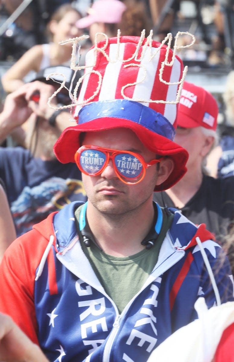 A supporter of former President Donald Trump before a rally Saturday at the Lorain County Fairgrounds in Ohio.