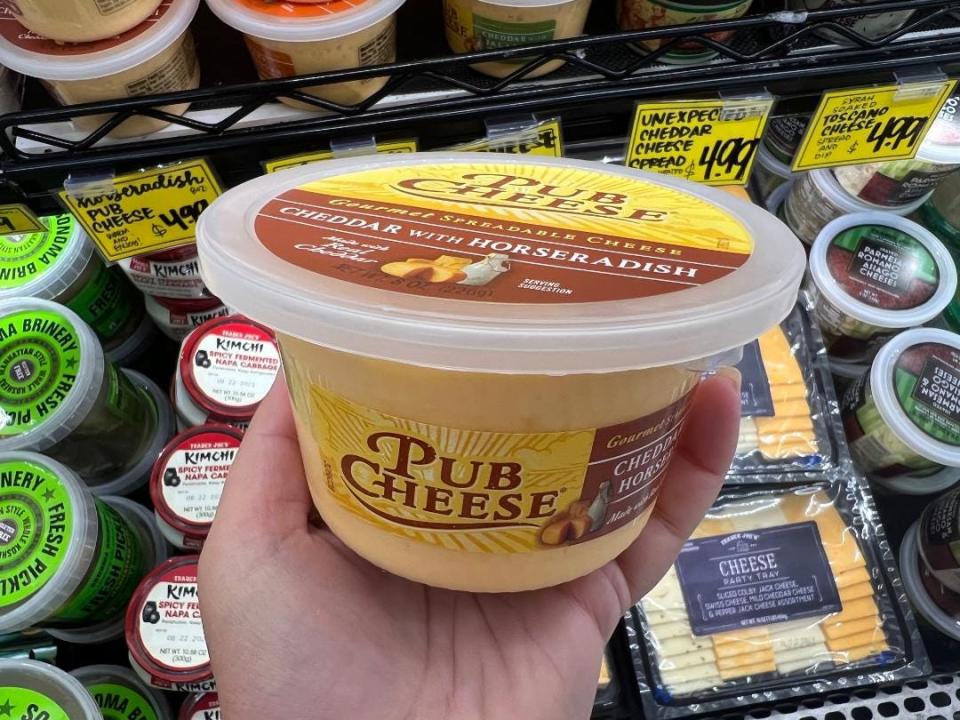 pub cheese at trader joe's in writer's hand