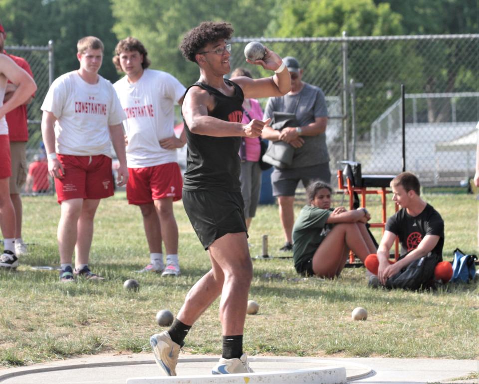 Wes Roberts of White Pigeon competes in the shot put event on Tuesday.