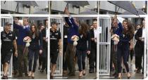 A combination picture shows Britain's Prince William holding an umbrella above his wife Catherine, the Duchess of Cambridge, and spilling water from the umbrella (R), before boarding two America's Cup yachts on Auckland Harbour April 11, 2014. Britain's Prince William and his wife Kate are undertaking a 19-day official visit to New Zealand and Australia with their son George. REUTERS/Fiona Goodall/Pool (NEW ZEALAND - Tags: ROYALS TPX IMAGES OF THE DAY)