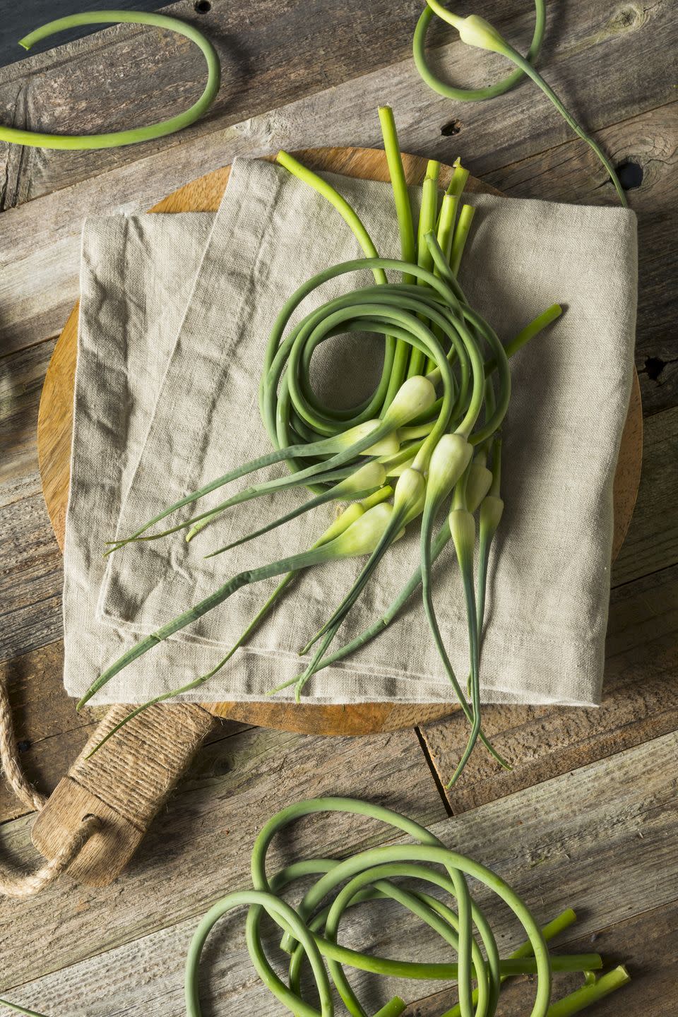 raw green organic garlic scapes