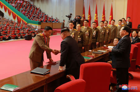 Party and nation citations are presented to scientists, technicians and workers who contributed to the successful launch of Intercontinental ballistic rockets, December 2017. KCNA/via REUTERS