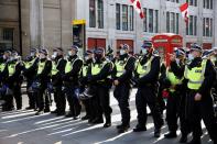 People gather in Trafalgar Square to protest against the lockdown imposed by the government, in London