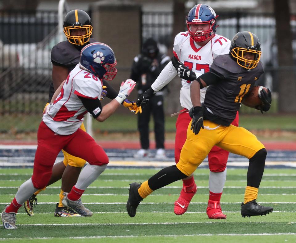 Detroit King's Blake Bailiff intercepts a pass by Mason's Cason Carswell during King's 46-7 win over Mason in the Division 3 state semifinal on Saturday, Nov. 20, 2021, at Wayne Memorial.