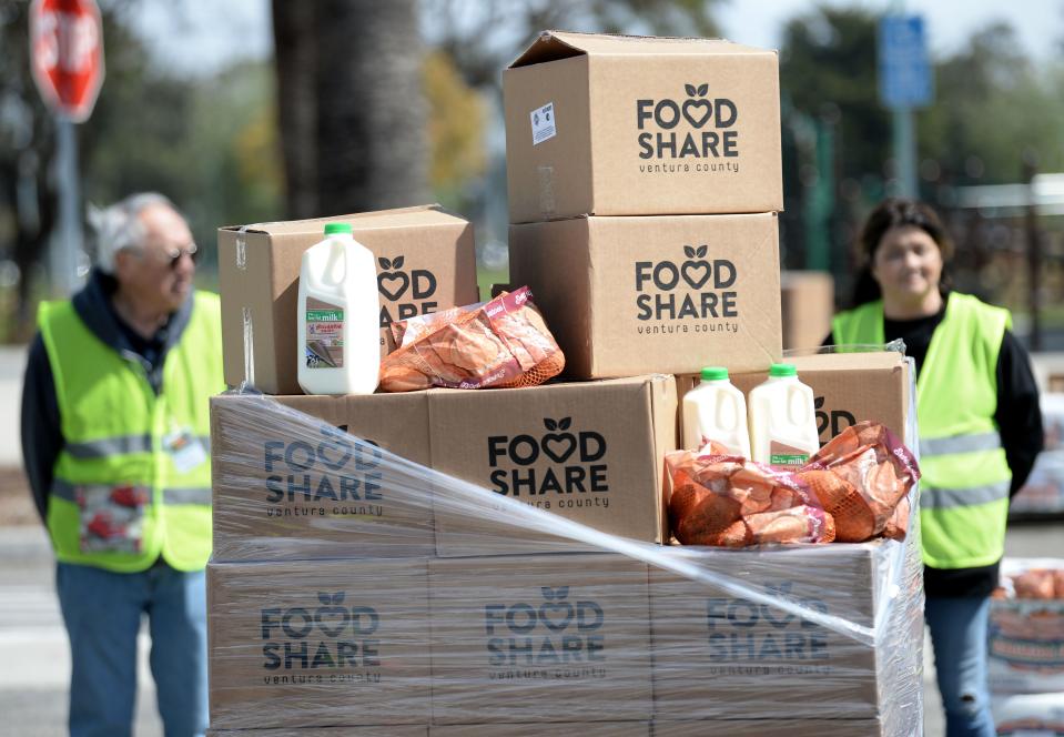 Boxes of food are stacked and ready for clients at a Food Share of Ventura County distribution in Oxnard on March 15.