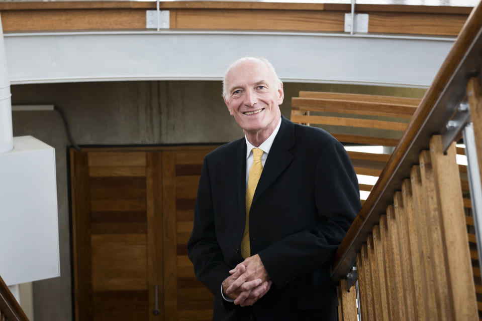 In this photo taken Wednesday, Feb. 5, 2014, Constitutional Court Judge Edwin Cameron is photographed inside the Constitutional Court In Johannesburg. In his published book “Justice: A Personal Account,” Cameron traces the hardship of his early life. Through a top education, he discovered the law as a way to repair a racially torn society and his own life, as well as the 1986 discovery that he was HIV positive.(AP Photo/Madelene Cronjé) SOUTH AFRICA OUT