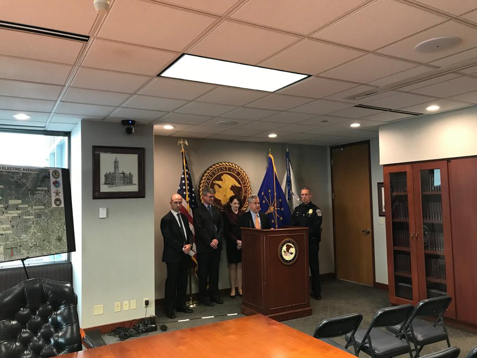 Then-U.S. Attorney Josh Minkler and other federal and local officials discuss the Grundy case in 2019.