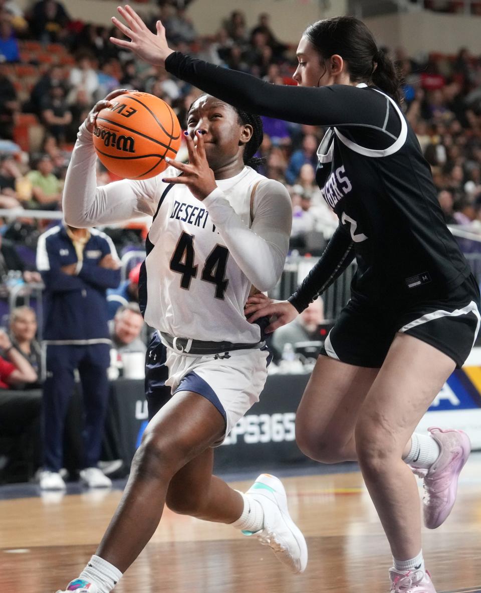 Desert Vista Thunder point guard Shay Ijiwoye drives in near the hoop against Millennium High School at Arizona Veterans Memorial Coliseum in Phoenix on March 4, 2023.