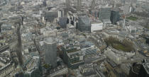 A view over the City of London from the 59th floor of 22 Bishopsgate in London, Thursday, April 1, 2021. (AP Photo/Alastair Grant)