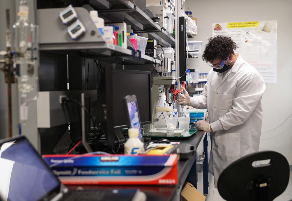 Spencer Strout, an IUPUI junior studying geology and chemistry, tests water samples for lead Thursday, June 3, 2021, at the school's engineering, science and technology building in Indianapolis. IUPUI is partnering with the Indianapolis Ministerium, a group of faith leaders in the city, to distribute free, anonymous lead testing kits to members of local church communities. IUPUI researchers test residents' water, soil and dust samples for elevated levels of lead, and if found, provide guidance on how to mitigate exposure.