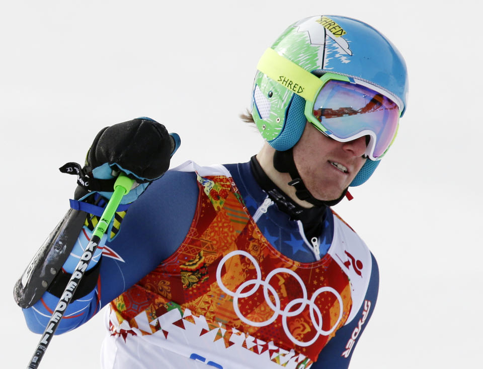 United States' Ted Ligety pauses after finishing in the first run of the men's giant slalom at the Sochi 2014 Winter Olympics, Wednesday, Feb. 19, 2014, in Krasnaya Polyana, Russia. (AP Photo/Gero Breloer)