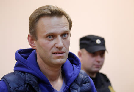 Russian opposition leader Alexei Navalny, who was detained over allegations of staging illegal protests, attends a court hearing in Moscow, Russia September 24, 2018. REUTERS/Maxim Shemetov