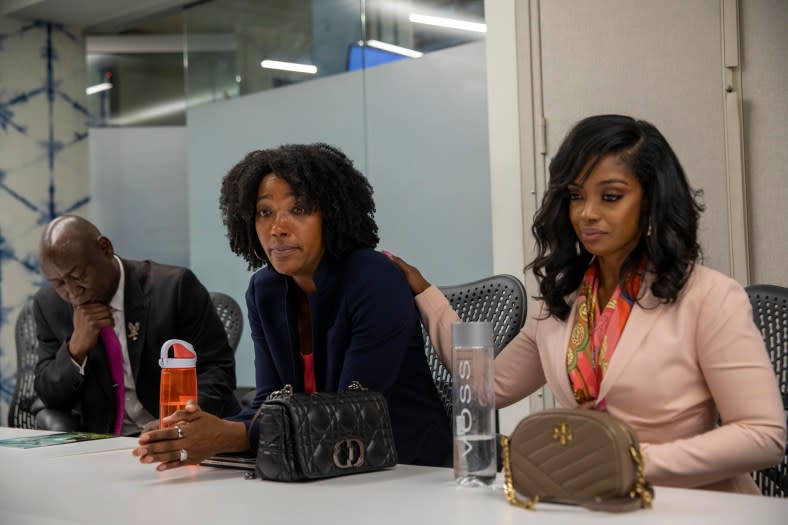 Arian Simone (right) president and CEO of Fearless Fund, comforts Ayana Parsons, the firm’s chief operating officer, during an Aug. 17 interview at the Fearless Fund town hall meeting at The Gathering Spot in Atlanta. At left is attorney Ben Crump, one of their legal representatives. (Photo by Alyssa Pointer for The Washington Post via Getty Images)