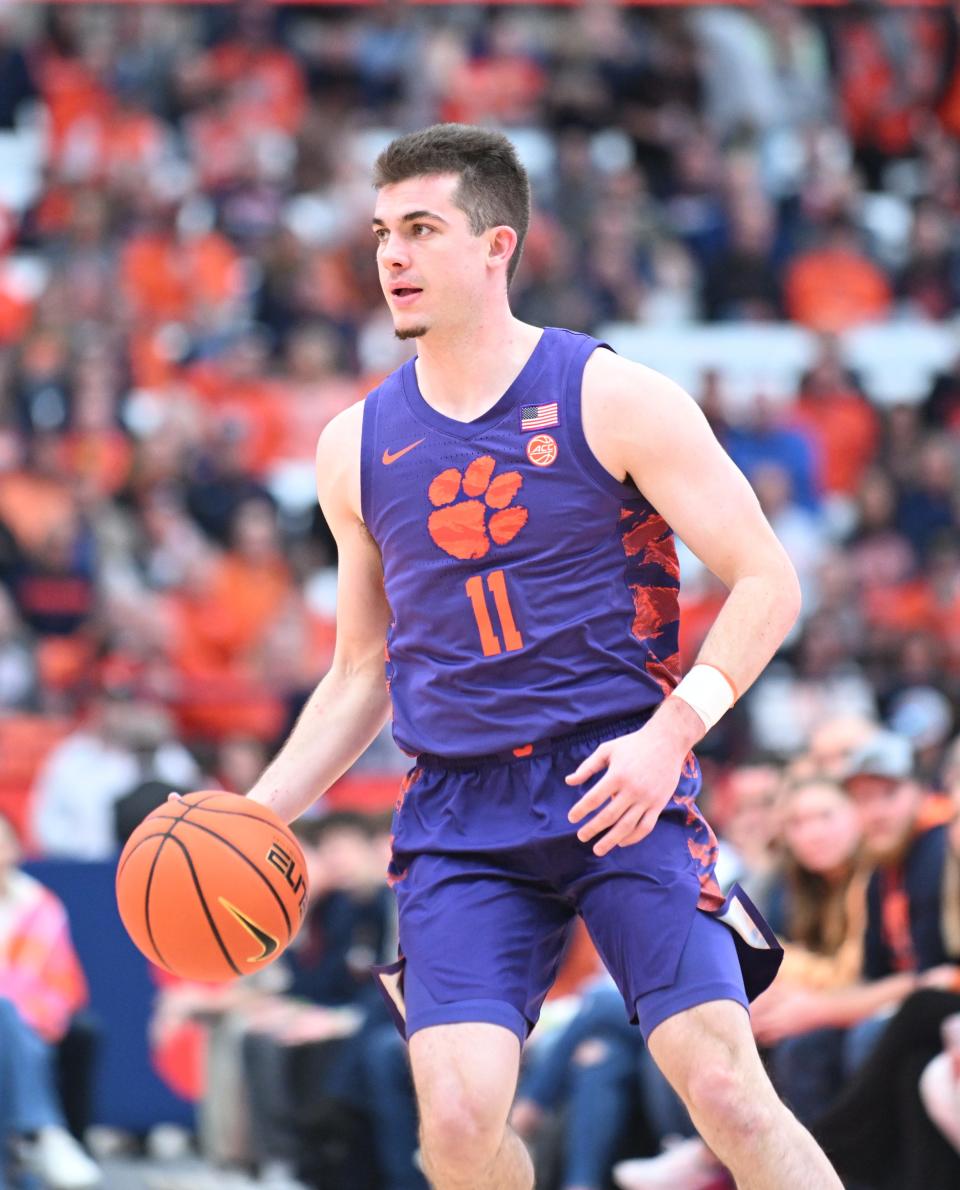 Feb 10, 2024; Syracuse, New York, USA; Clemson Tigers guard Joseph Girard III (11) handles the ball in the first half against the Syracuse Orange at the JMA Wireless Dome. Mandatory Credit: Mark Konezny-USA TODAY Sports