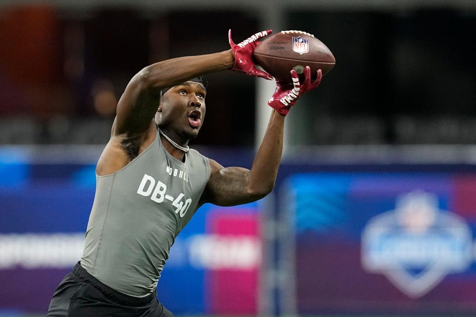 Alabama defensive back Jordan Battle runs a drill at the NFL football scouting combine in Indianapolis, Friday, March 3, 2023. (AP Photo/Darron Cummings)