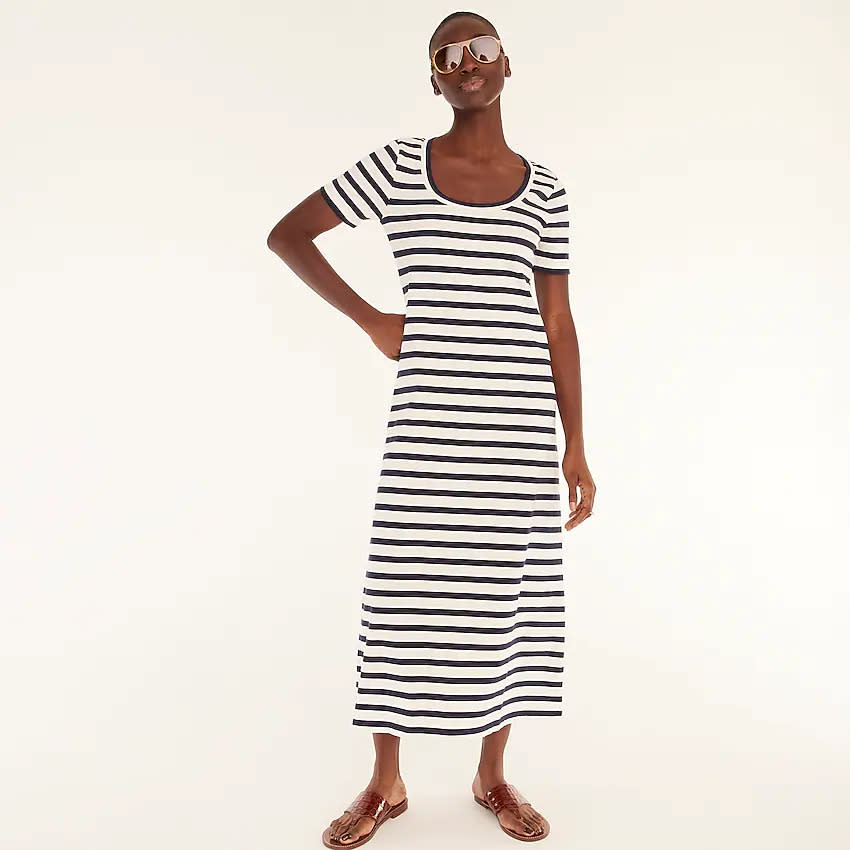 Woman in midi-length striped dress (Photo: J.Crew)