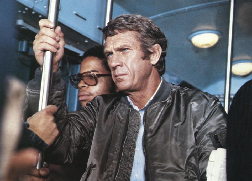 Steve McQueen wears the classic flight jacket in “The Hunter.”