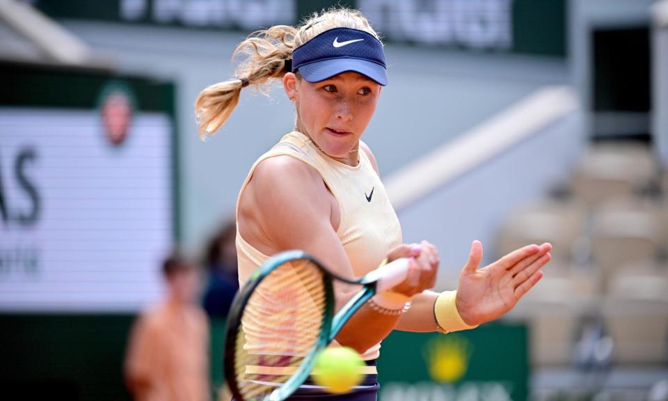 <span>Mirra Andreeva plays a forehand during her win over Aryna Sabalenka to reach her first grand slam semi-final.</span><span>Photograph: Lionel Hahn/Getty Images</span>