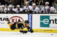 BOSTON, MA - APRIL 03: Brad Marchand #63 of the Boston Bruins trips as he tries to hang on to the puck against the Pittsburgh Penguins on April 3, 2012 at TD Garden in Boston, Massachusetts. (Photo by Elsa/Getty Images)