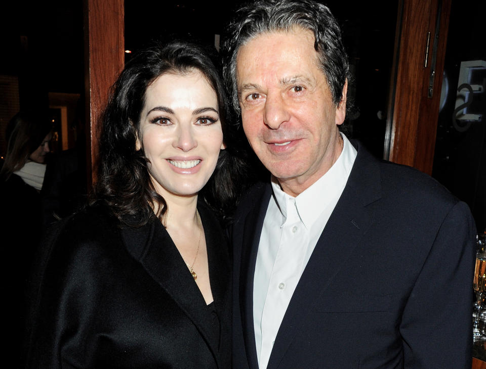 LONDON, ENGLAND - JANUARY 19:  (EMBARGOED FOR PUBLICATION IN UK TABLOID NEWSPAPERS UNTIL 48 HOURS AFTER CREATE DATE AND TIME. MANDATORY CREDIT PHOTO BY DAVE M. BENETT/GETTY IMAGES REQUIRED)  Nigella Lawson (L) and Charles Saatchi attend a dinner hosted by Joseph Group CEO Sara Ferrero and Vogue UK editor-at-large Fiona Golfar at Joe's Restaurant on January 19, 2012 in London, England.  (Photo by Dave M. Benett/Getty Images)