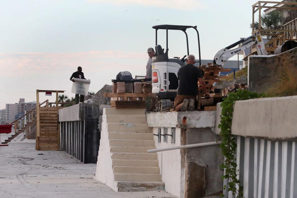 Contractors were at work Tuesday on seawalls in Wilbur-by-the-Sea, where property owners are still dealing with damage from Tropical Storms Ian and Nicole as yet another storm, Hurricane Idalia, is forecast to affect Volusia County on Wednesday.