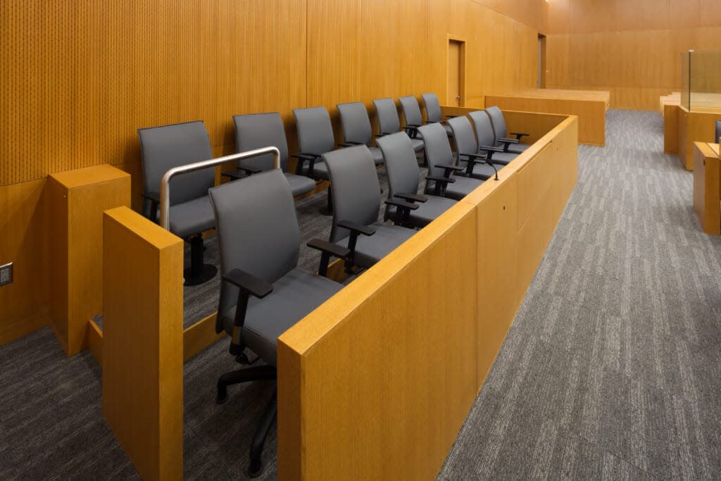 Jury Box in a court room via Adobe Stock