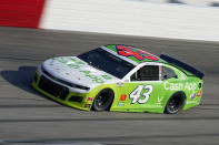 FILE - In this Sept. 6, 2020, file photo, Bubba Wallace (43) runs during a NASCAR Cup Series auto race in Darlington, S.C. The pandemic only accelerated the inevitable: The driver market bubble, pushed to its limit with multi-million dollar salaries for nearly two decades, is about to burst. A major reset has arrived and team owners have all the power. They can pick and choose between drivers who bring sponsorship dollars (Bubba Wallace) or drivers who have won races (Erik Jones). (AP Photo/Chris Carlson, FIle)