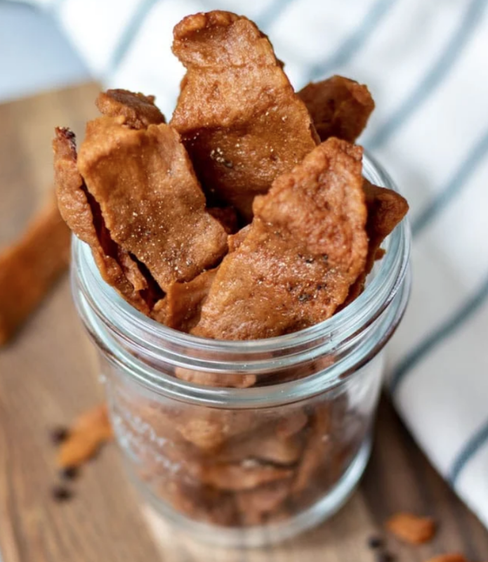 <p>My Quiet Kitchen</p><p>This vegan teriyaki seitan jerky is easy to prepare, low in fat, and high in both protein and flavor! It does require some time and a little prep work, but it's way more affordable than specialty jerky you find in stores and is so worth the effort.</p><p><strong>Get the recipe: <a href="https://myquietkitchen.com/teriyaki-seitan-jerky/" rel="nofollow noopener" target="_blank" data-ylk="slk:Teriyaki Seitan Jerky;elm:context_link;itc:0;sec:content-canvas" class="link rapid-noclick-resp">Teriyaki Seitan Jerky</a></strong></p>