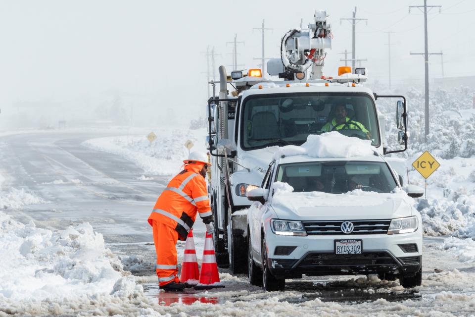 Highway 138 was closed at Beekly Road in Phelan CA on Saturday February 25, 2023. Some parts received a foot of snow in Saturday’s storm. (James Quigg, for the Daily Press)